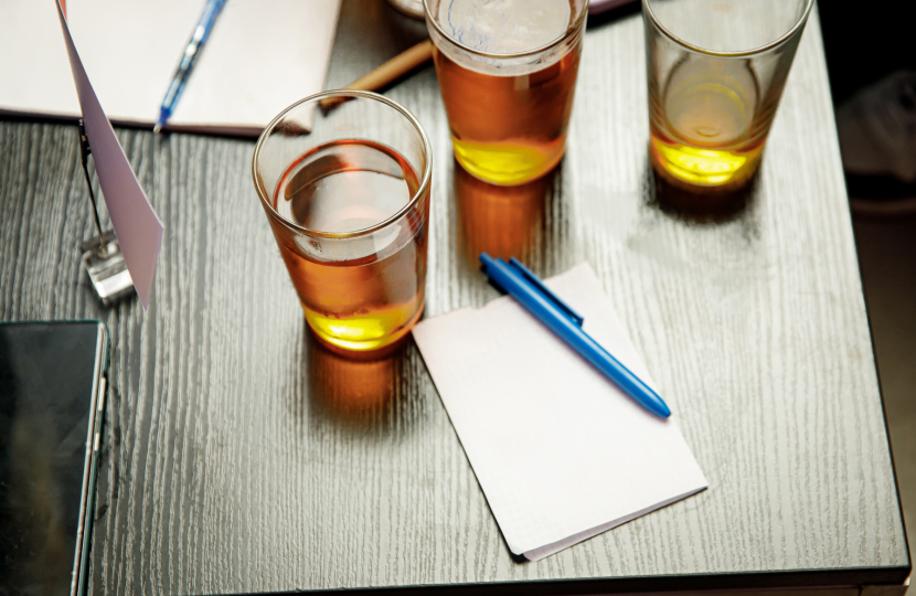 Photo of pints and quiz paper on a table