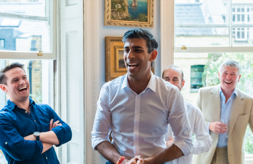 Rishi speaks with CLWCA members at an event in Marylebone
